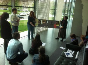 Jenna and Lynn with the paper prototype of their multitouch exhibit