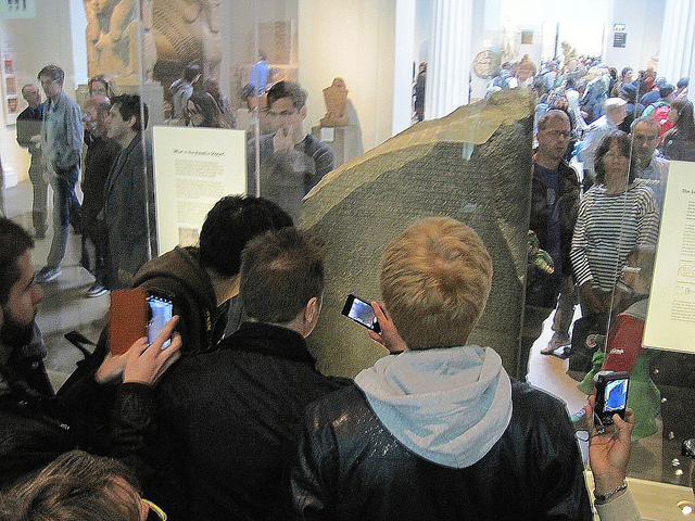 Photographing the Rosetta Stone by Flickr user Snapshooter46 CC-BY-NC-SA 2.0